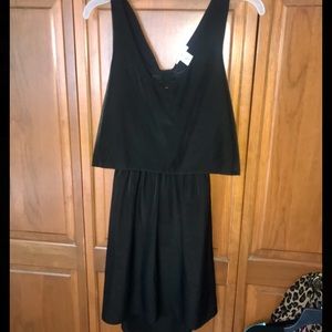Black sleeveless dress with open back